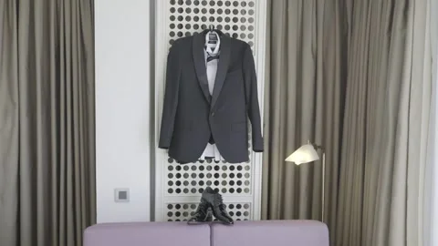 Groom suit on the wall 動画素材 141883493