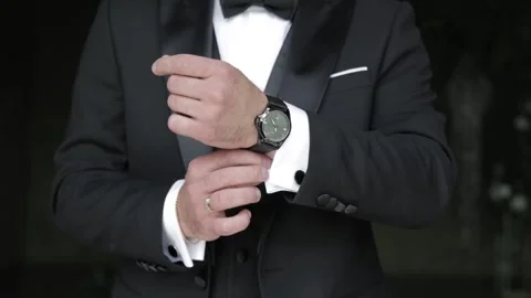 Groom Suiting Up in a Black Suit Stock Footage 300491823