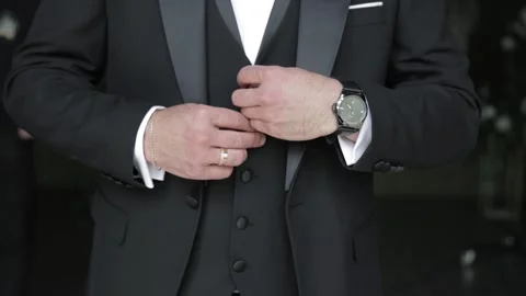 Groom Suiting Up in a Black Suit 스톡 동영상 300491881