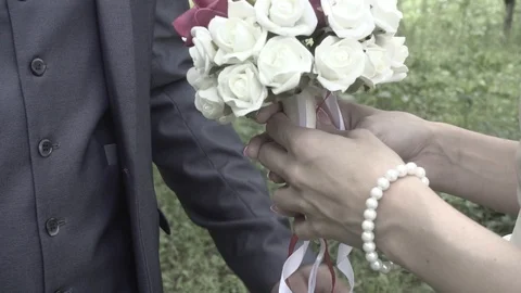 The groom takes the bride hands. Stock Footage 96000176