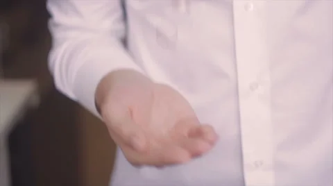 The Groom Throws the Two Rings on the Right Hand Stock Footage 62772579