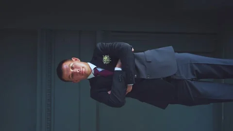 The groom turns to the camera Stock Footage 252853617