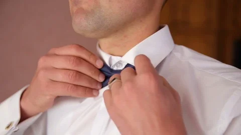 The groom wears a butterfly Stock Footage 80707817