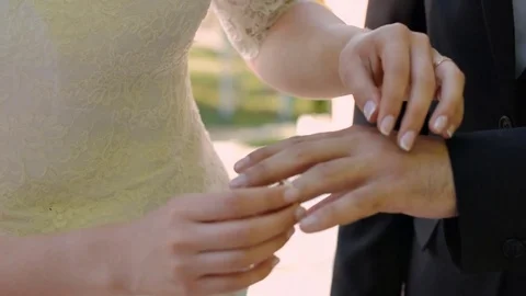 The groom wears the ring bride. Wedding ceremony. Stock Footage 70056476
