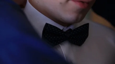 Groom, wedding, set the bowtie straight Stock Footage 99366169