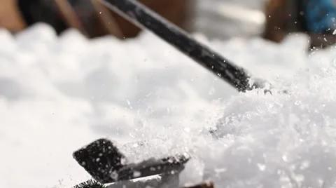 Grooming snow with rake - 2 clips Stock Footage 37624999