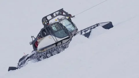 Grooming the snow on a ski slope Stock Footage 285396791
