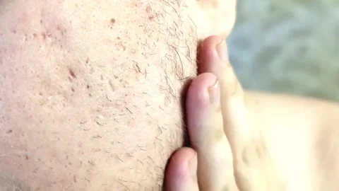 Grooming tips for achieving a smooth, well-maintained beard at home Stock Footage 305491325