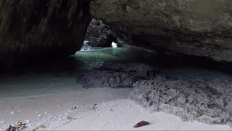 Grotto between Rocks at Sandy Beach, Sipalay, Negros island, Philippines Video stock 336793766
