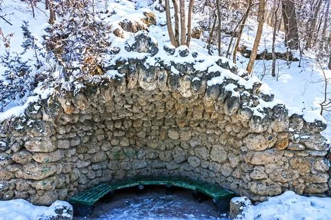 Grotto in the park. Stock Photos