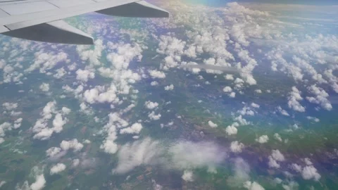 Ground from airplane window looking down on clouds near Paris, Stock Footage 275558652
