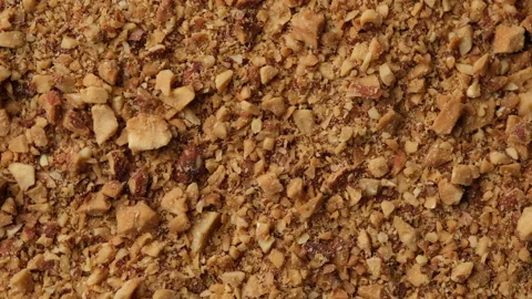 Ground Almond nuts close up. Crushed Almond kernels rotating. 스톡 동영상 202880433