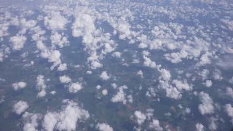 Ground and clouds from airplane window near Paris Stock Footage 275558651