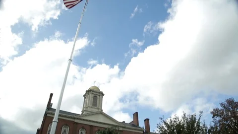 Ground angle shot of Morris County court house exterior with pan down, day. Video stock 107202705
