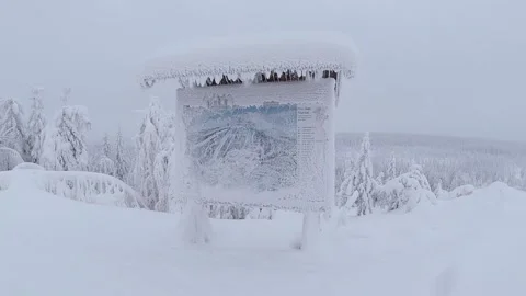 Ground angle of snow flakes falling on a frosty slope map on top of a mountain. Stock Footage 146666517