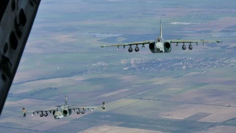 Ground Attack Aircraft Armed with Rockets in Flight. Bulgarian Sukhoi Su25. Stock Footage 71181193