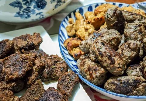 Ground Beef and Lamb in different shapes roasted in various Herbs and Spices Stock Photos