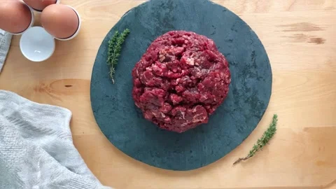 Ground beef for cutlets on a black background Stock Footage 222079510
