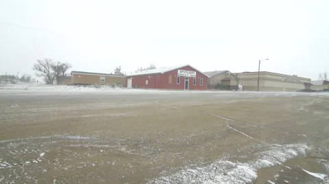 Ground blizzard pan to fire hydrant on Indian reservation Stock Footage 40320989
