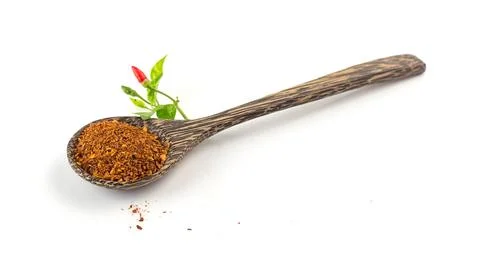Ground chilli on white Stock Photos