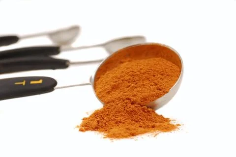 Ground cinnamon in a measuring spoon Stock Photos