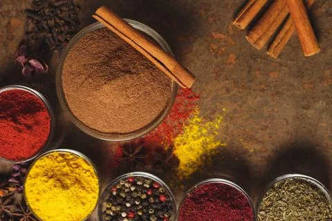 Ground Cinnamon. Place for text. Different types of Spices in a bowl on a stone Stock Photos