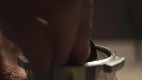 Ground coffee is bottled in the cone of the coffee machine Stock Footage 278208201