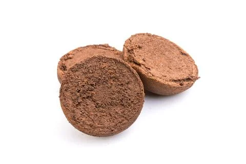 Ground coffee from coffee machine isolated on white background Stock Photos