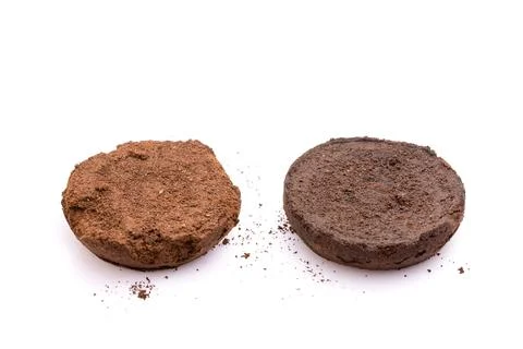 Ground coffee from coffee machine isolated on white background Stock Photos