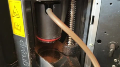 Ground coffee dispensing into brewing unit inside vending machine, automatic Stock Footage 337117112