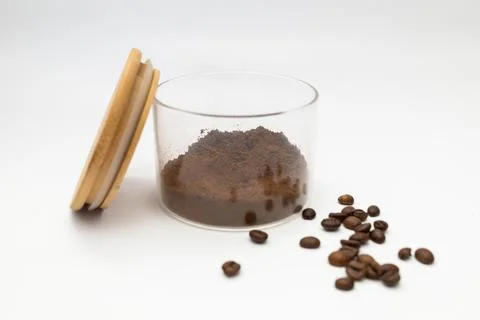 Ground coffee in a jar on a white background Stock Photos