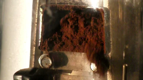 Ground coffee poured from grinder Stock Footage 27458821