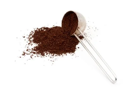 Ground coffee with spoon Stock Photos