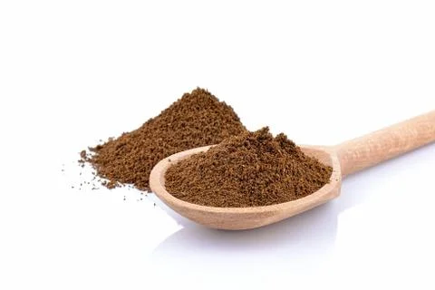 Ground coffee on spoon Stock Photos