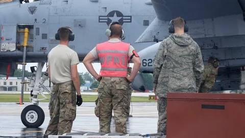 Ground crew and pilots prepare an A-10 Thunderbolt II 'Warthog' Stock Footage 111602385
