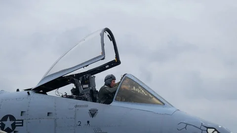 Ground crew and pilots prepare an A-10 Thunderbolt II 'Warthog' Stock Footage 111604338