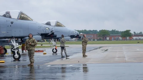 Ground crew and pilots prepare an A-10 Thunderbolt II 'Warthog' Stock Footage 111604412