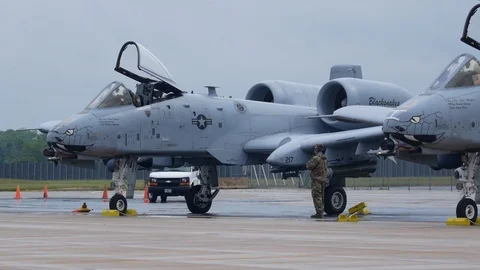 Ground crew and pilots prepare an A-10 Thunderbolt II 'Warthog' Stock Footage 111605247