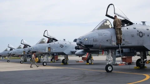 Ground crew and pilots prepare an A-10 Thunderbolt II 'Warthog' Stock Footage 111607447