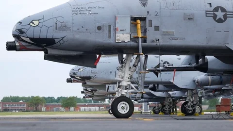 Ground crew and pilots prepare an A-10 Thunderbolt II 'Warthog' Stock Footage 111608386