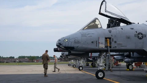 Ground crew and pilots prepare an A-10 Thunderbolt II 'Warthog' Stock Footage 111608731
