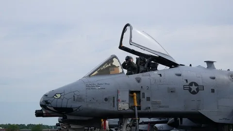 Ground crew and pilots prepare an A-10 Thunderbolt II 'Warthog' Stock Footage 111610000