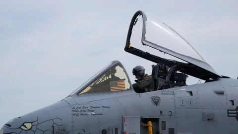 Ground crew and pilots prepare an A-10 Thunderbolt II 'Warthog' Stock Footage 111610531