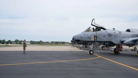 Ground crew and pilots prepare an A-10 Thunderbolt II 'Warthog' Stock Footage 111611167