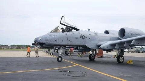 Ground crew and pilots prepare an A-10 Thunderbolt II 'Warthog' Stock Footage 111613295