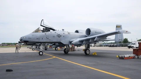 Ground crew and pilots prepare an A-10 Thunderbolt II 'Warthog' Stock Footage 111613745