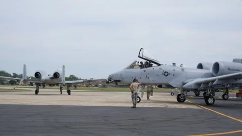 Ground crew and pilots prepare an A-10 Thunderbolt II 'Warthog' Stock Footage 111614553