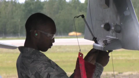 Ground crew maintenance engineer Red Flag Alaska Stock Footage 32589635
