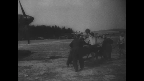 Ground crew re-load and refuel German planes Stock Footage 103388418