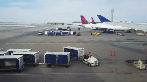 Ground crews working around aircraft at airport Stock Footage 59172424